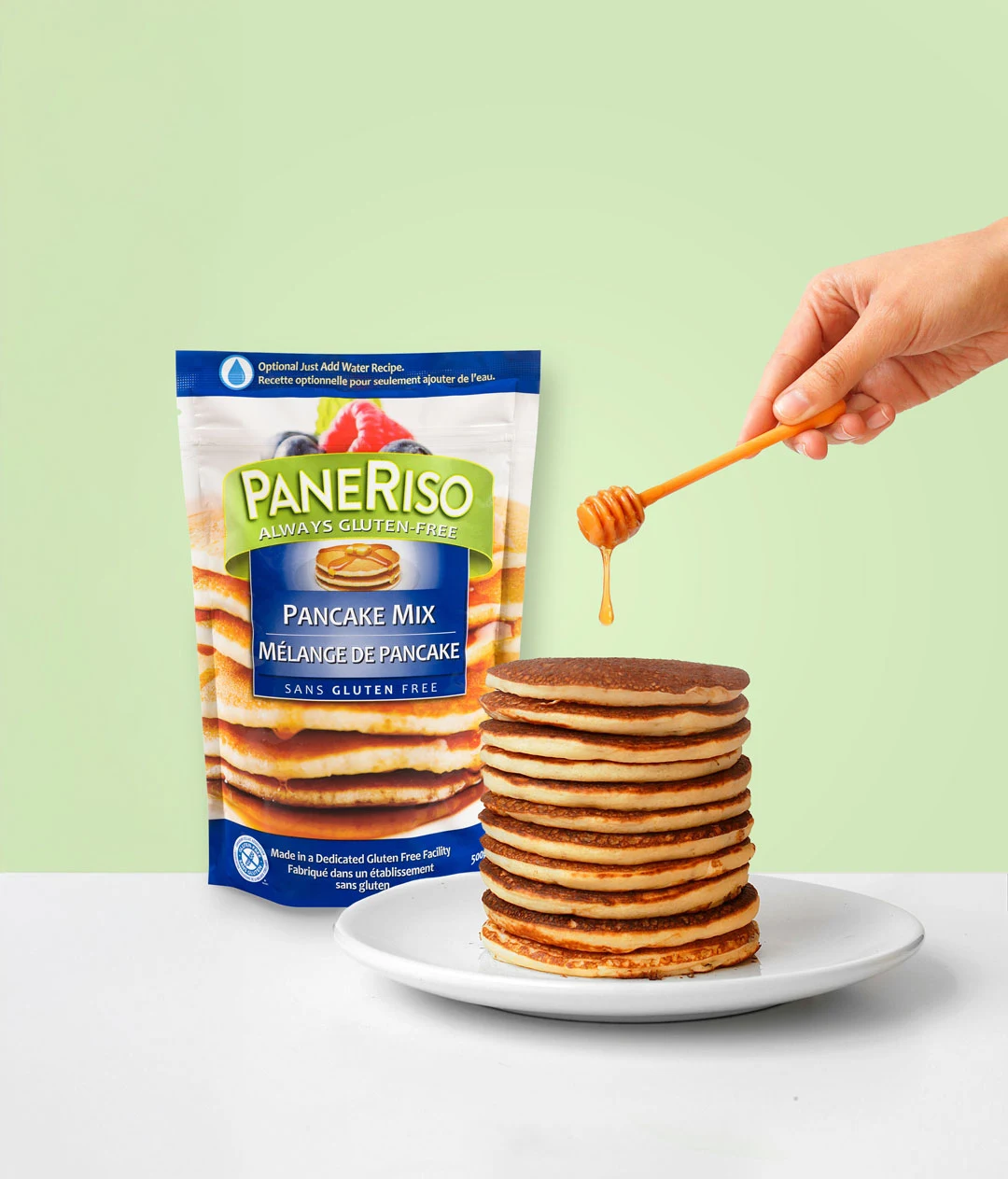 Pancake mix and a stack of pancakes